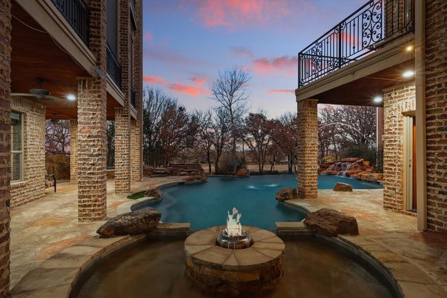 The wading pool with fire pit is the perfect place to hang out in the evening and roast smores. | Image 5
