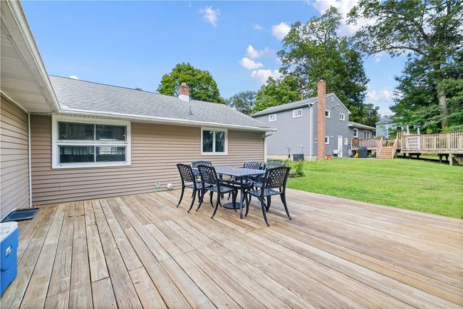 Wooden deck featuring a yard | Image 27