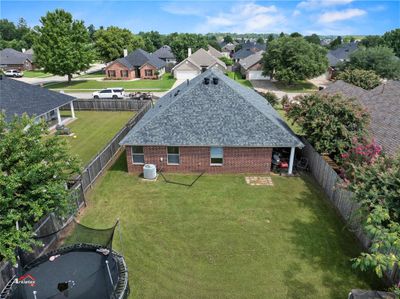 Bird's eye view of the back of the property. | Image 2