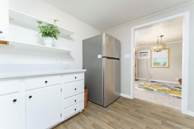Entering into the 11x11 kitchen with new flooring | Image 8