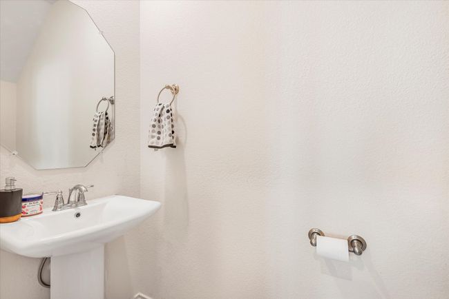 Bathroom featuring a sink | Image 4