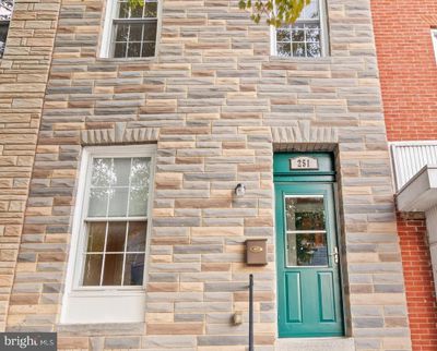 251 S Washington Street, Townhouse with 3 bedrooms, 3 bathrooms and null parking in BALTIMORE MD | Image 1