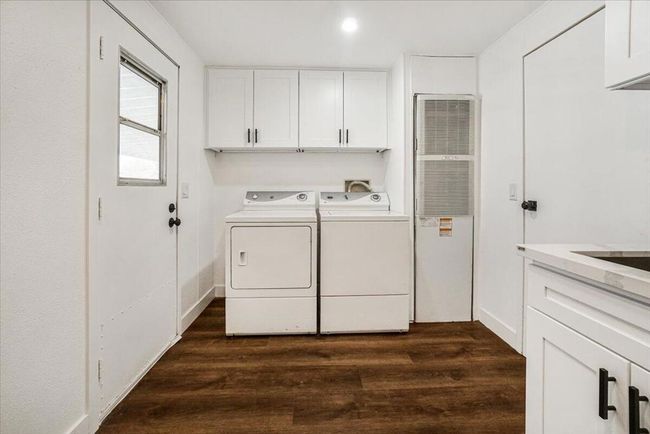 large laundry and storage area | Image 38
