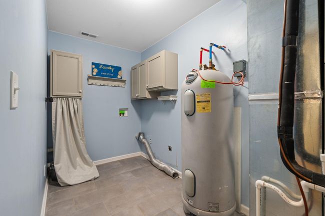 basement utility room. | Image 41