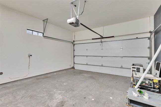 Garage with a garage door opener | Image 39
