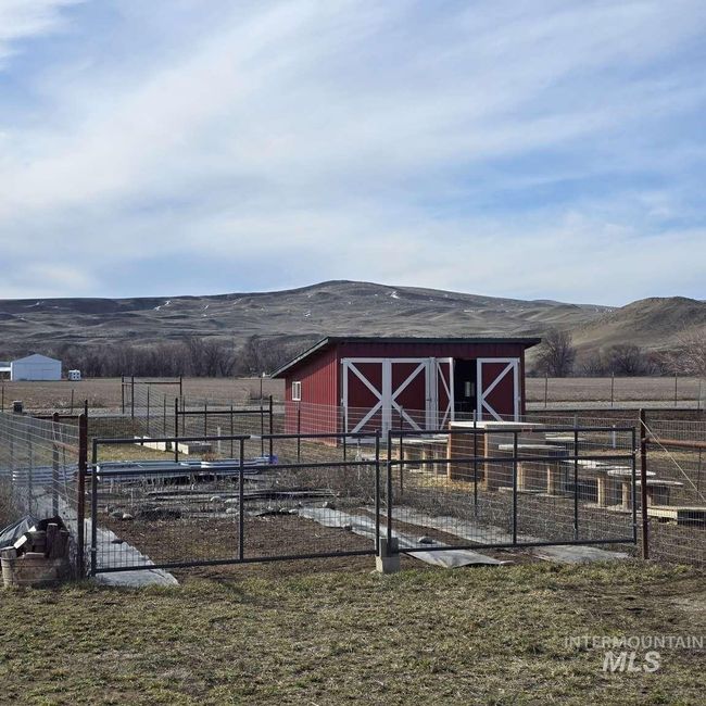 Horse barn with a rural view and a mountain view | Image 27
