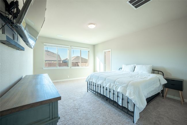 Bedroom with carpet | Image 16