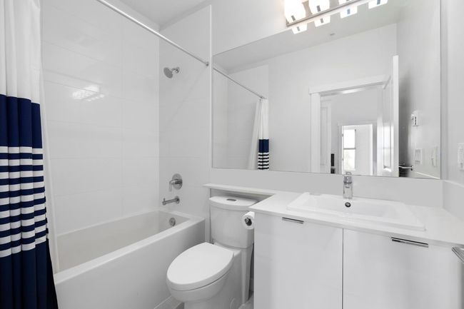 Full bath with shower / tub combo, toilet, and vanity | Image 21