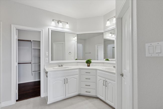 Primary Bathroom featuring double vanity | Image 18