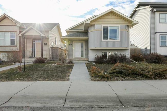 248 Sunridge Road W, Home with 4 bedrooms, 2 bathrooms and 2 parking in Lethbridge AB | Image 1