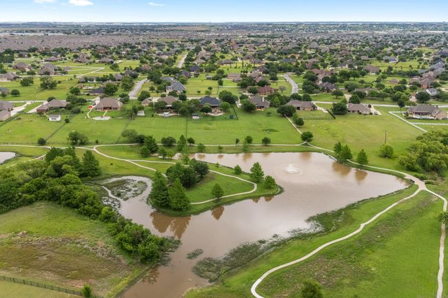 It's hard to find a subdivision as beautiful as this one with one-acre home sites and gorgeous homes. Come check it out and see if you fall in love with this area! | Image 40