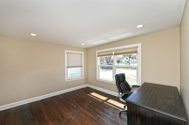 Office featuring recessed lighting, dark wood finished floors, and baseboards | Image 11
