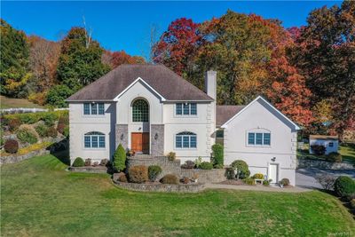 Move right into this spacious Bedford Corners Colonial, 6, 000+ sq ft, 4-bedroom , 3.5-bathroom home, perfectly situated on a peaceful cul-de-sac just a short distance to the train, shops, and town | Image 1