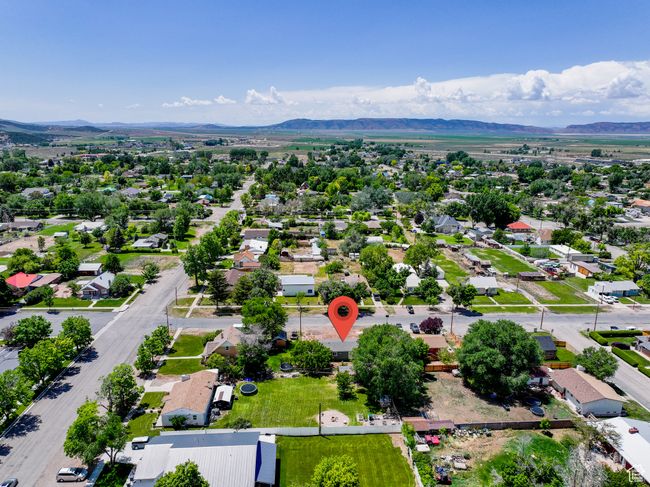 Aerial view of residential area with mountains | Image 28
