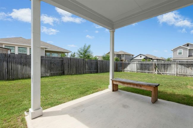 Fenced backyard with a patio and a residential view | Image 37