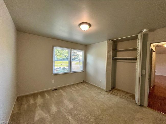 Bedrooms upstairs are carpeted, freshly cleaned! | Image 8