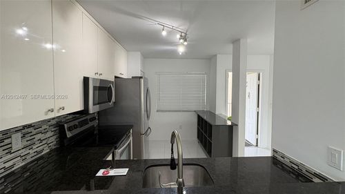 j308-9560 Weldon Cir, Tamarac, FL, 33321-0999 | Card Image
