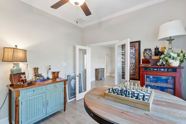 A warm and welcoming office space filled with natural light, ideal for quiet reading, study sessions, or creative projects. | Image 10