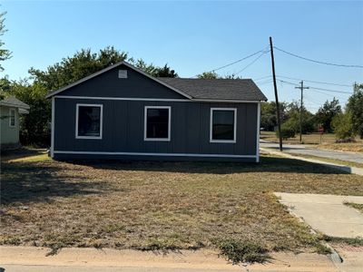 View of home's exterior featuring a lawn | Image 2