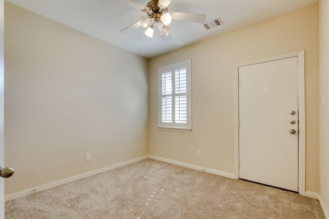 Bedroom 3 on 1st Floor with Covered Patio access | Image 31