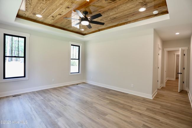 Beauty in the details - wood trey ceiling & LVP flooring throughout | Image 20