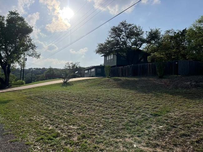Neighbor's house on a large lot. | Image 17