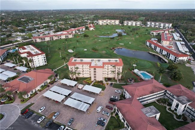 Bird's eye view with a water view | Image 11