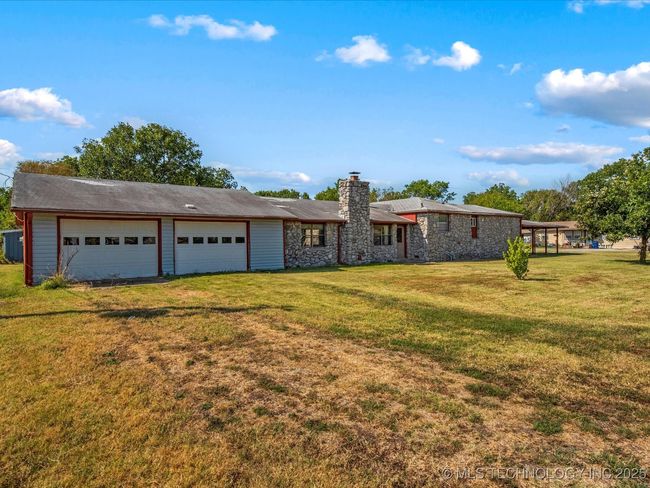 side of home facing road | Image 19