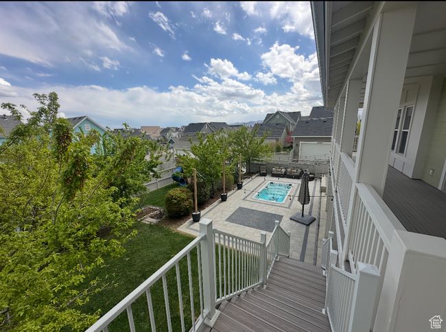 Balcony with a residential view and a patio area | Image 76