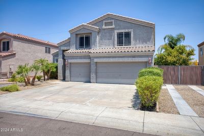 Additional parking at side of home, inside gate and out | Image 3