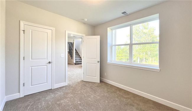 The third bedroom, one of two on the lower level. Great for guests! | Image 50