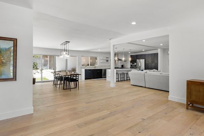 Living area with recessed lighting, light wood-style floors, and baseboards | Image 4