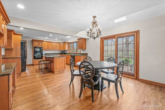 Spacious kitchen with large eating area | Image 21