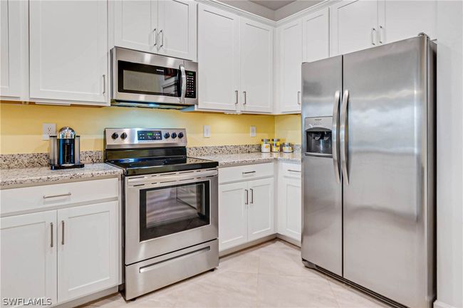 14008 Winding Cedar Way, House attached with 3 bedrooms, 2 bathrooms and null parking in FORT MYERS FL | Image 10