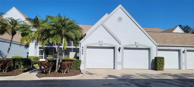 Garage easy entry from Verandas private driveway and large guest parking area | Image 40