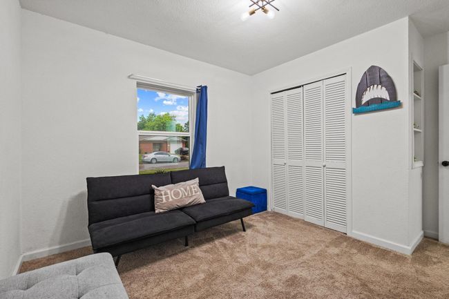 Sitting room featuring carpet and baseboards | Image 23