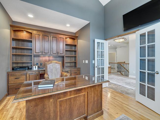 Stunning built-ins and maple hardwood floors! | Image 14