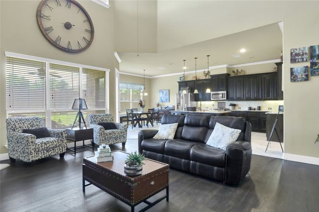 Living room to kitchen view. | Image 8