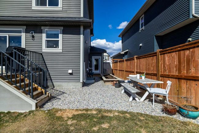 556 Boulder Creek Bay Se, Home with 3 bedrooms, 2 bathrooms and 4 parking in Langdon AB | Image 37