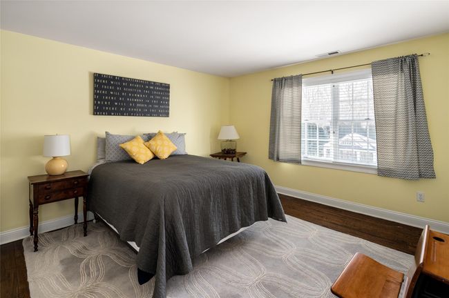Bedroom featuring and dark hardwood flooring | Image 22