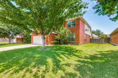 View of front of property with a garage and a front yard | Image 3