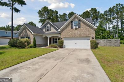 141 Timberland Circle, House other with 4 bedrooms, 2 bathrooms and 2 parking in Richmond Hill GA | Image 3