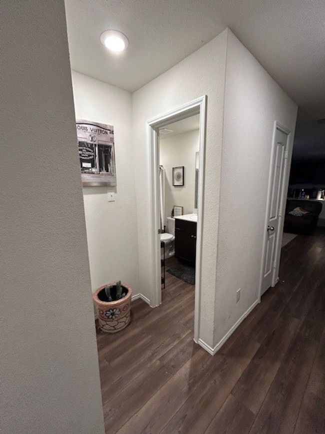 Guest bathroom with vinyl flooring throughout. | Image 4