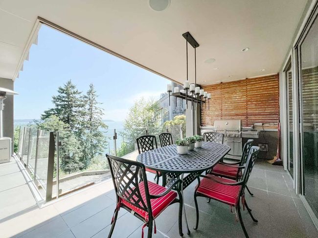View of patio with outdoor dining space | Image 19