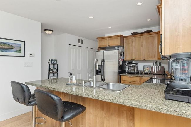 Kitchen island with bar seating | Image 13