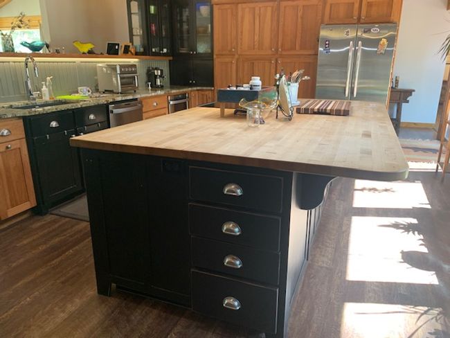 Kitchen featuring butcher block breakfast nook | Image 15