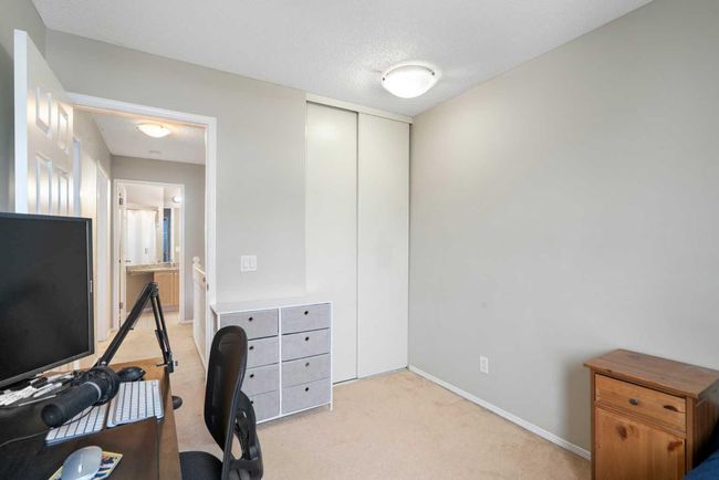 219 Coachway Lane Sw, Townhouse with 3 bedrooms, 3 bathrooms and 2 parking in Calgary AB | Image 28