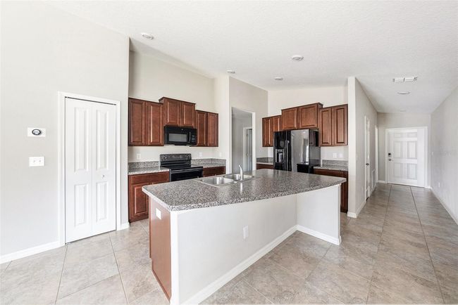 7211 Ozello Trail Ave, House other with 3 bedrooms, 2 bathrooms and null parking in SUN CITY CENTER FL | Image 9