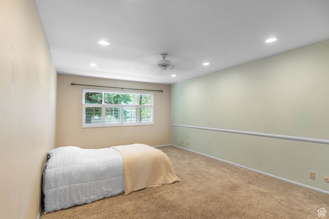 Carpeted bedroom featuring recessed lighting, baseboards, and ceiling fan | Image 22