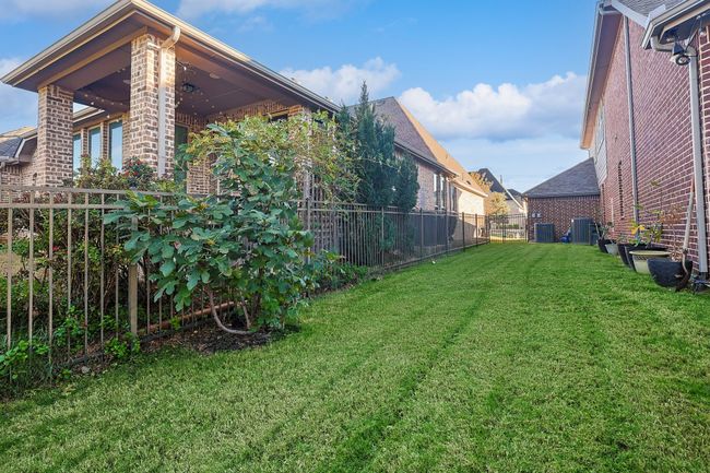 View of yard with lush grass. | Image 35